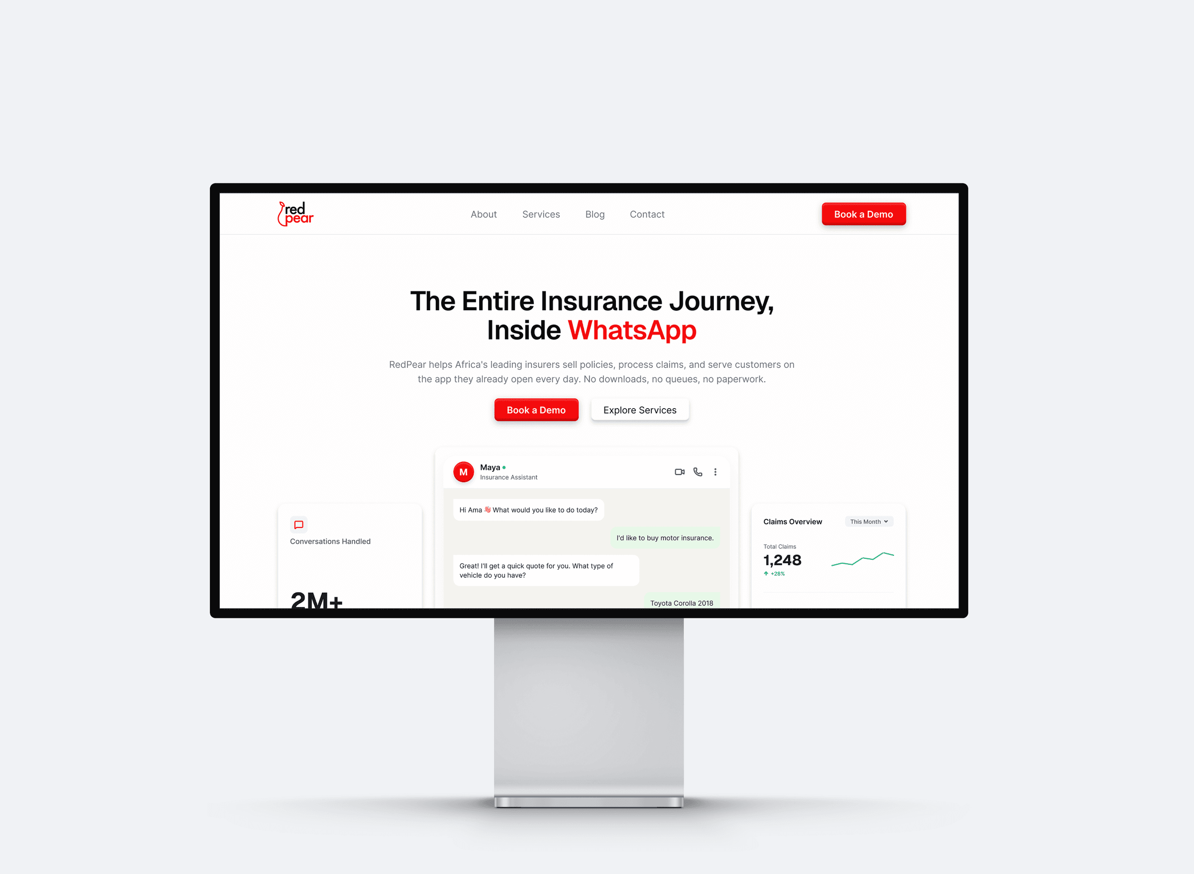 The redesigned RedPear homepage on a desktop monitor, its hero reading The Entire Insurance Journey, Inside WhatsApp above a Maya chat panel and a claims dashboard